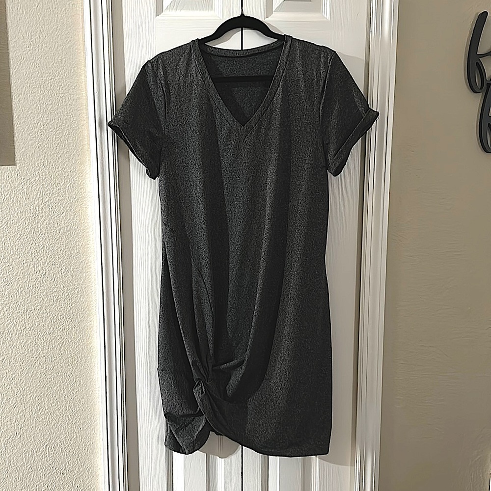 This is a super cute dress to dress up or down in dark gray size XL large.